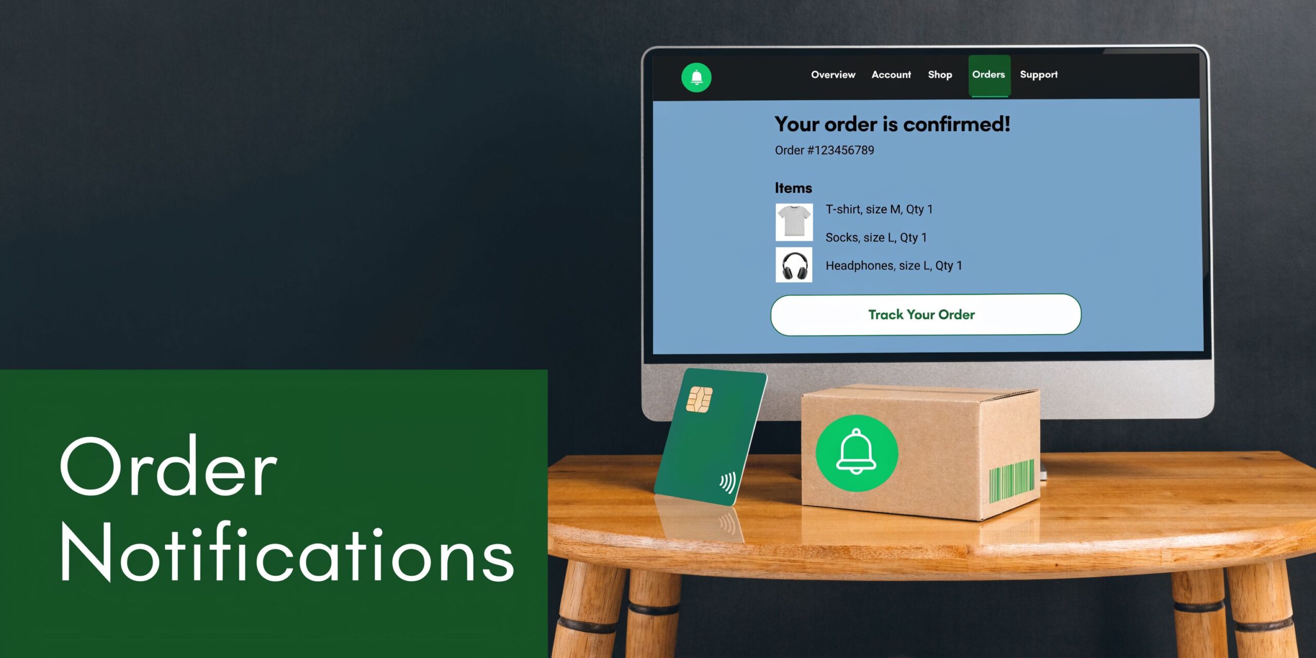 A computer screen showing an order confirmation page next to a package and credit card on a table.